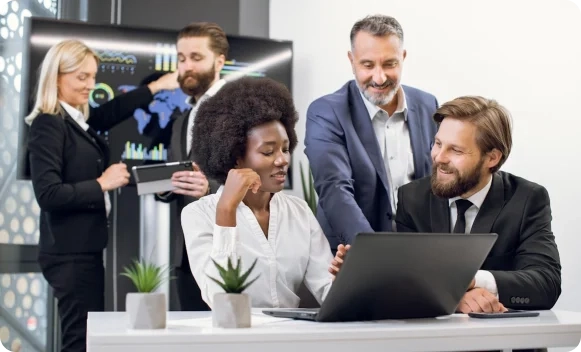 Employees collaborating together.